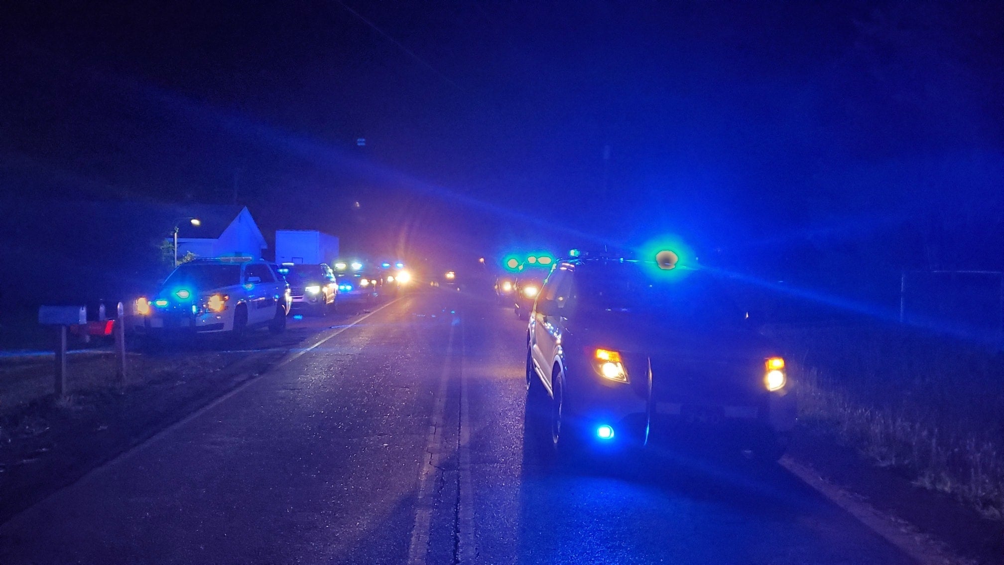 Police at the scene of a shooting in Valhermoso Springs, Alabama, in which seven people were killed.