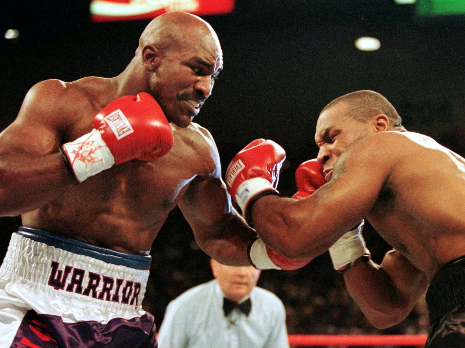 Evander Holyfield was 'ready to bite Mike Tyson in the face' until a higher  power told him not to | The Independent | The Independent