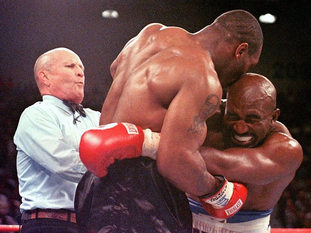 Tyson bit Holyfield on both ears during the third round of their heavyweight rematch