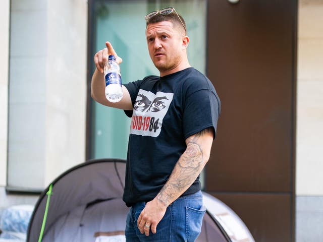 Tommy Robinson arrives at arrives at Westminster Magistrates' Court in London to support Britain First leader Paul Golding on 20 May, 2020.