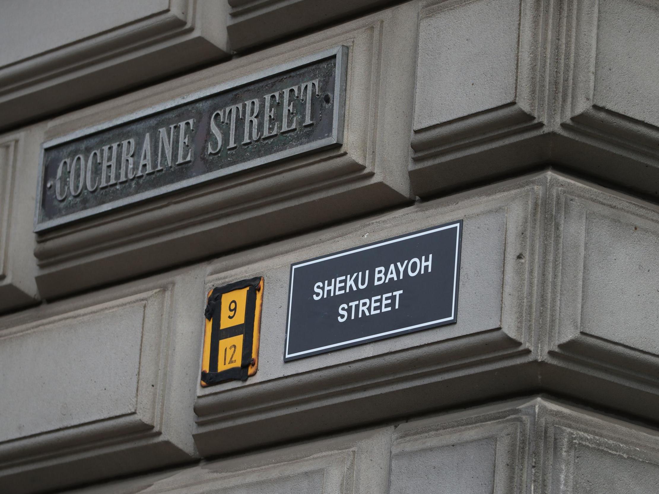 A sign alternatively naming Cochrane Street 'Sheku Bayoh Street' in Glasgow on 6 June, 2020.