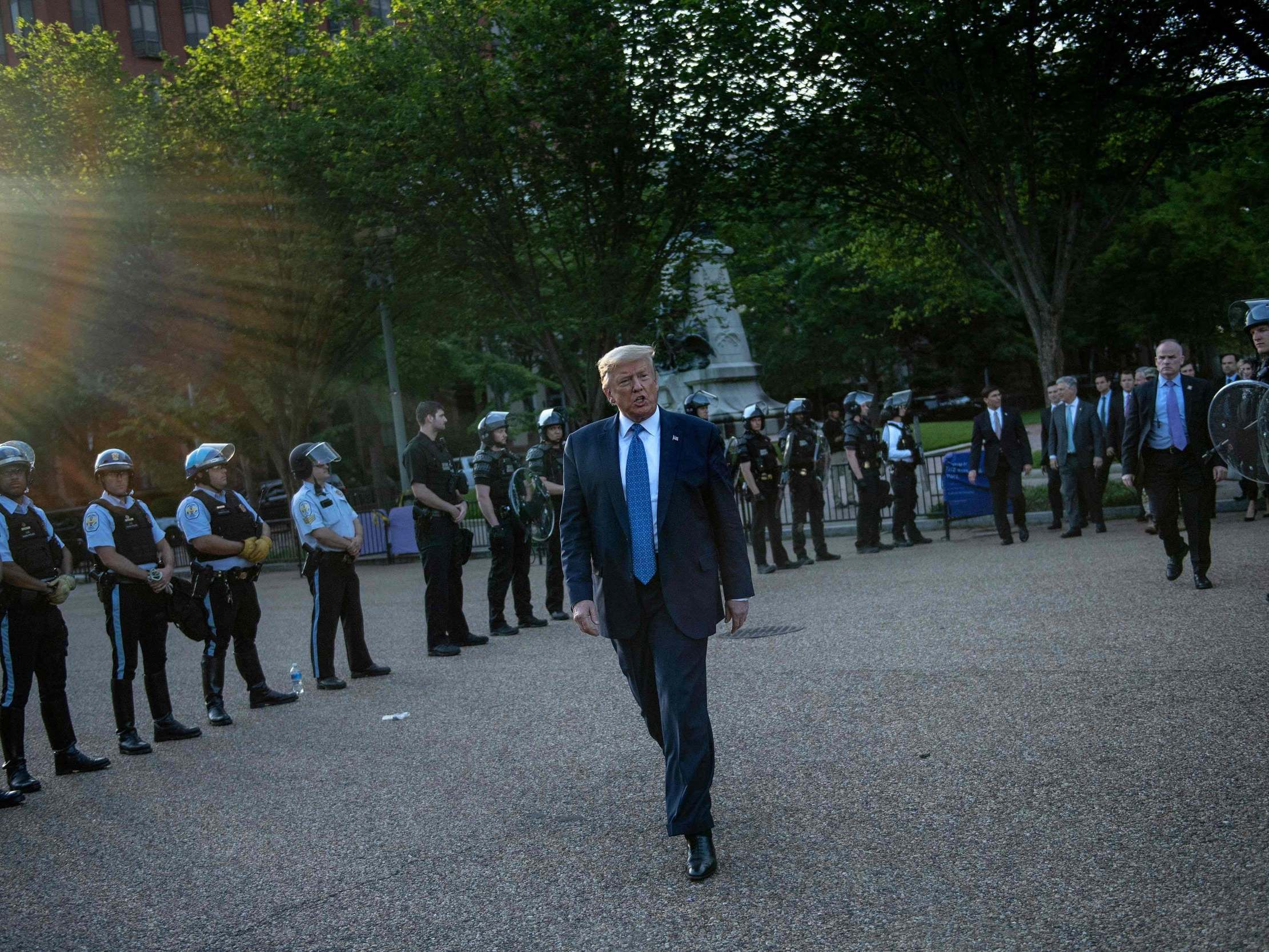 Donald Trump leaves the White House to walk to St John’s Episcopal church on 1 June