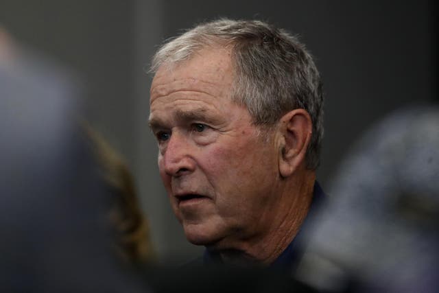 ARLINGTON, TEXAS - OCTOBER 06: Former President George W. Bush attends the NFL game between the Dallas Cowboys and the Green Bay Packers at AT&T Stadium on October 06, 2019 in Arlington, Texas.