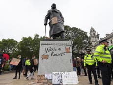Winston Churchill statue daubed with 'was a racist' graffiti