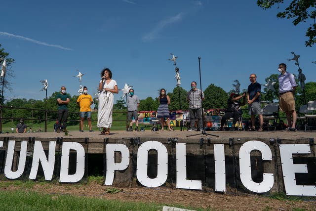 Minneapolis councillor Alondra Cano speaks at a rally after two weeks' protest over the death of George Floyd and wider problems of police violence