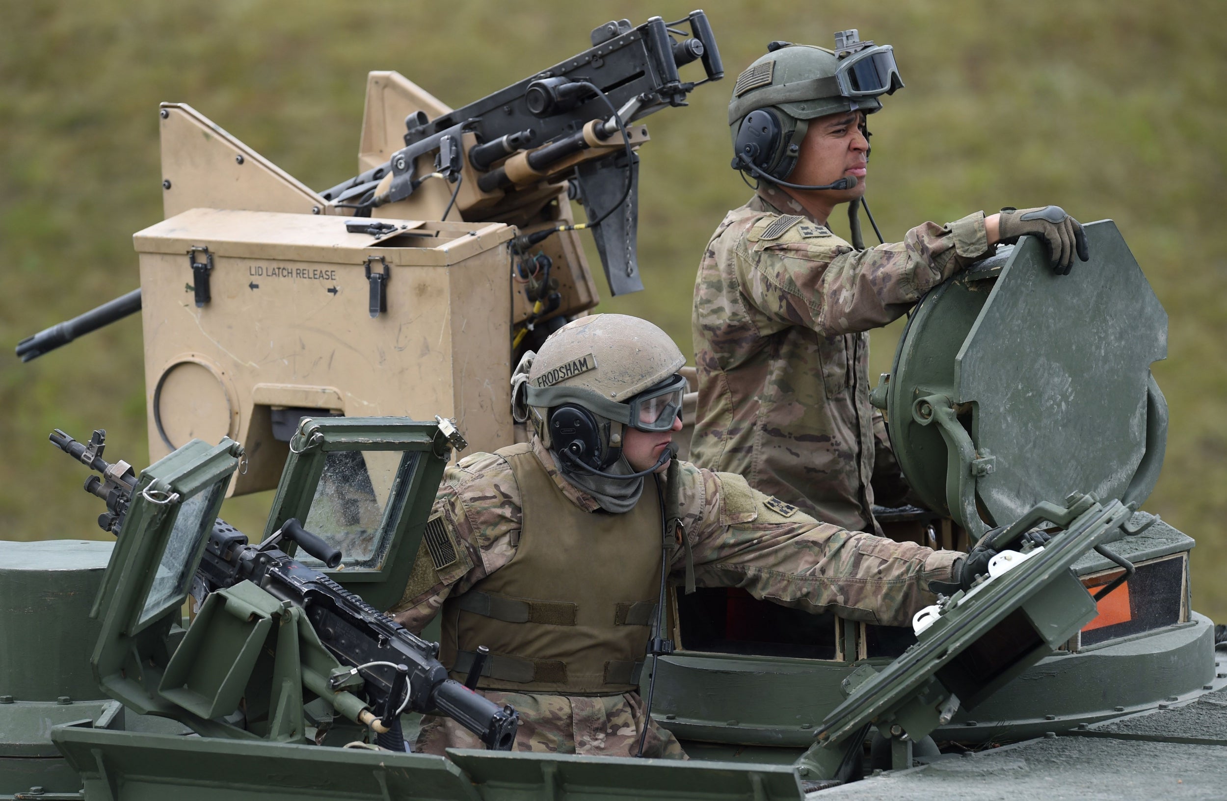 US soldiers sit in a tank type ‘M1A2 SEP’ during the exercise ‘Strong Europe Tank Challenge 2017’ at the exercise area in Grafenwoehr, Germany