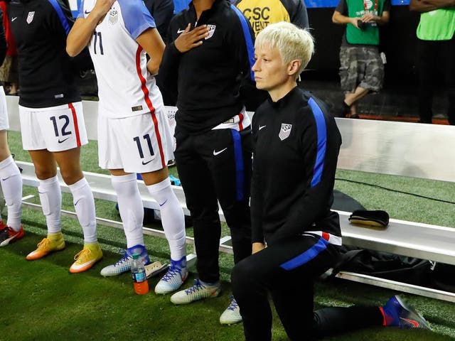 Megan Rapinoe kneeling during the US national anthem in 2016