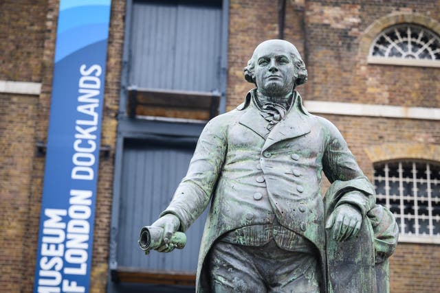 A statue of Robert Milligan outside the Museum of London Docklands 8 June, London, England