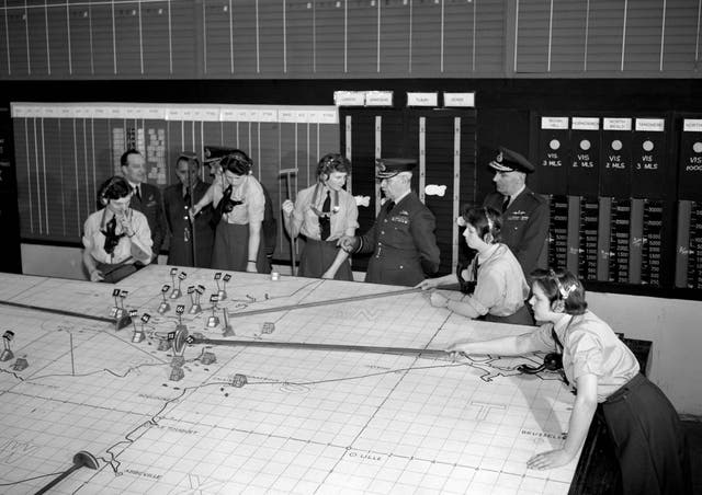Lord Dowding (centre) visits the underground operations room at RAF Uxbridge, the controlling nerve centre of fighter command during the Battle of Britain