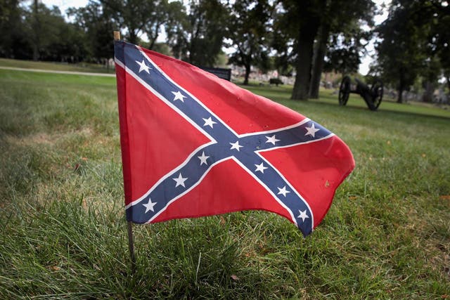 A Confederate Navy jack flag sits at the base of Confederate Mound