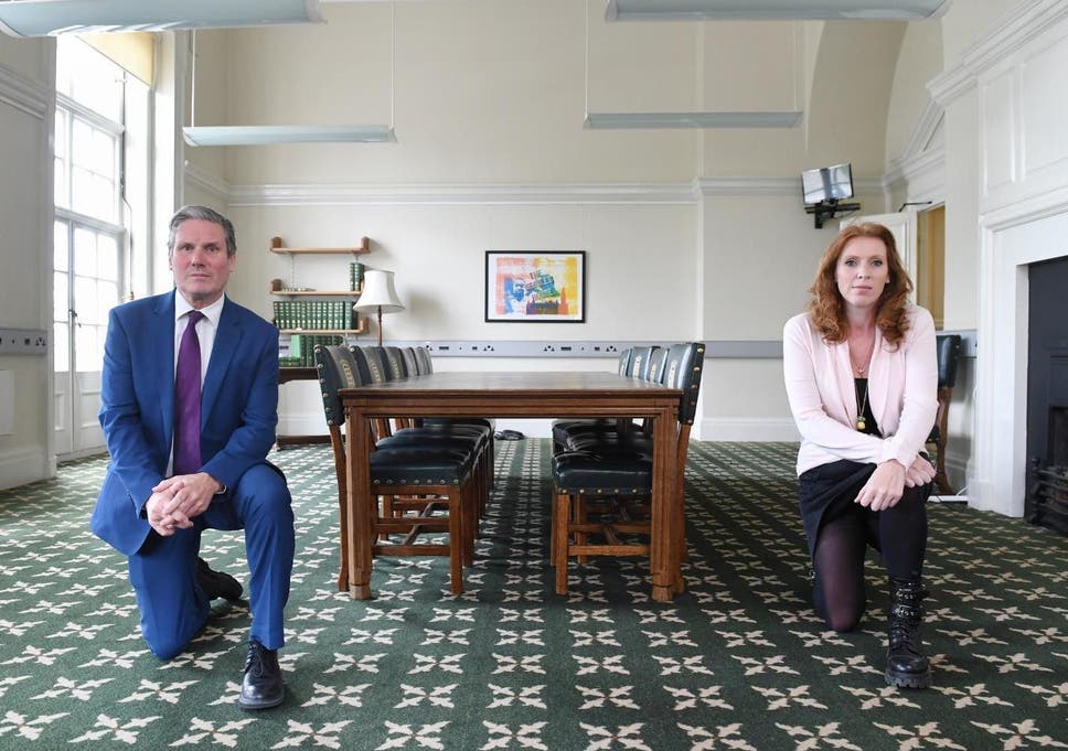 Sir Keir Starmer and deputy Labour leader Angela Rayner adopt the famous protest stance