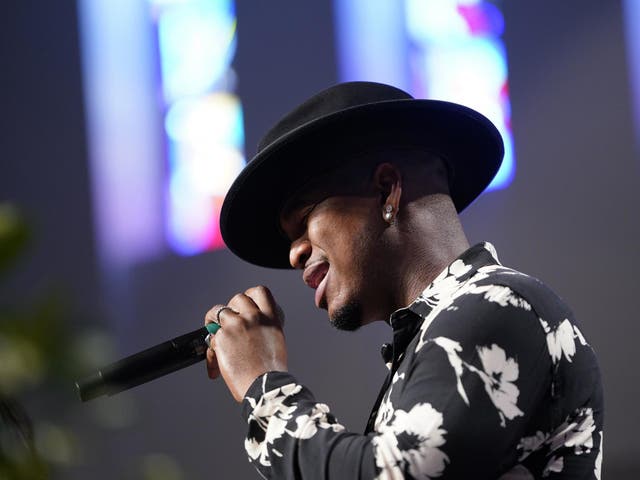 Singer Ne-Yo sings during the funeral service for George Floyd at The Fountain of Praise church Tuesday, June 9, 2020, in Houston.