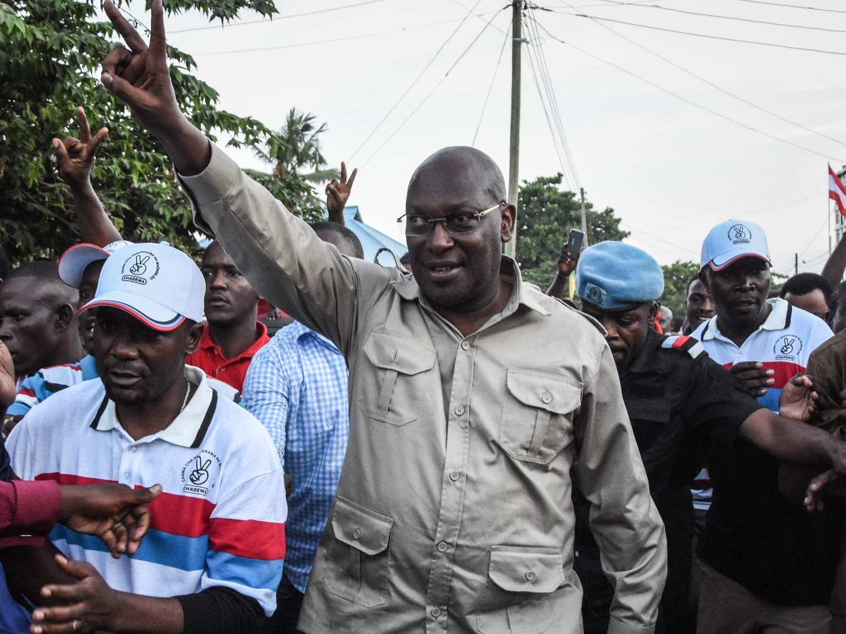 Chadema party chair Freeman Mbowe (centre) was attacked in his home