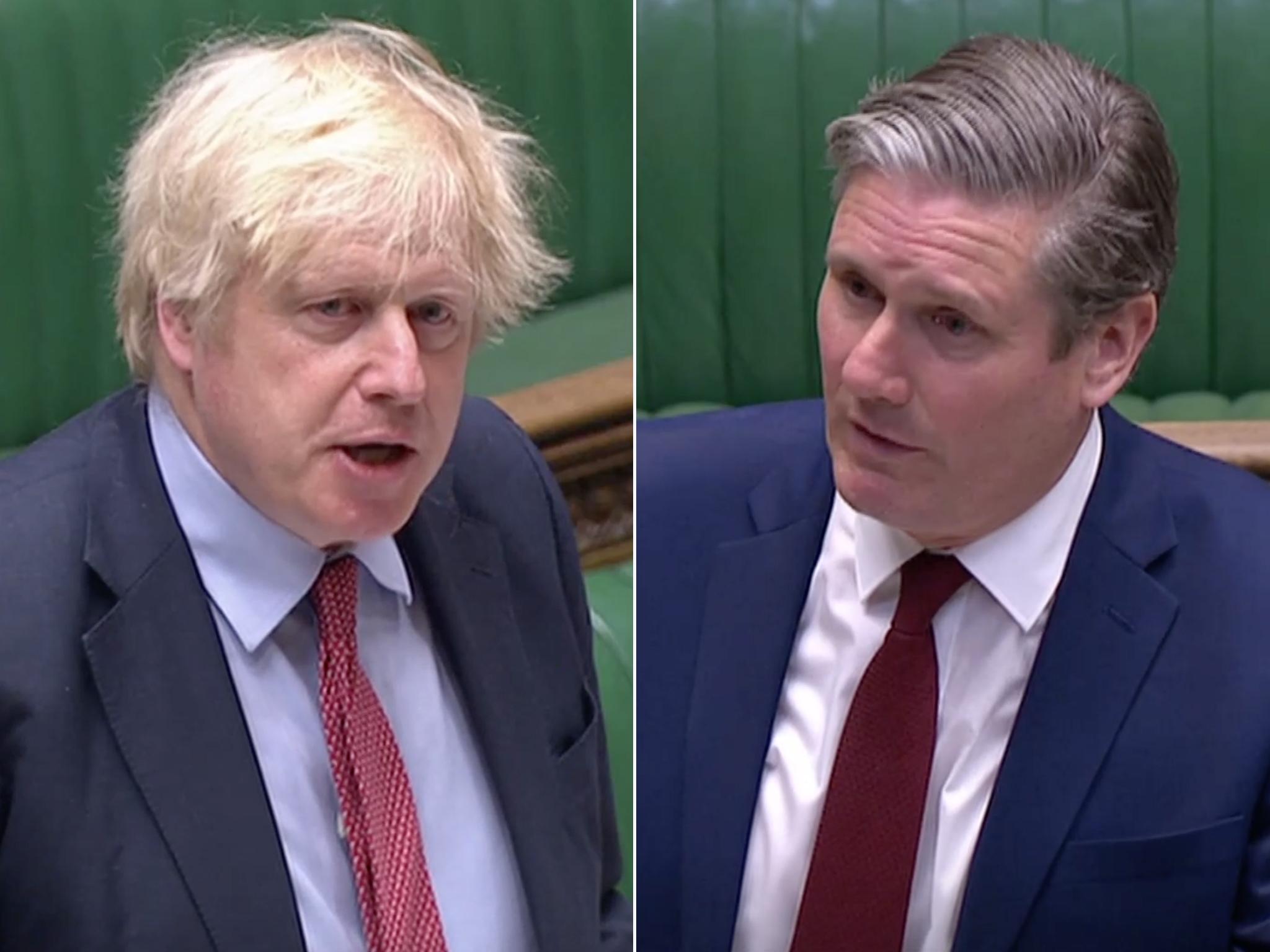 Boris Johnson and Keir Starmer clash during PMQs