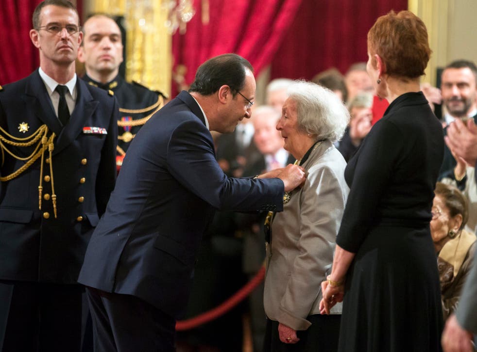 Francois Hollande awards Rol-Tanguy with the Legion of Honour medal in 2014 for her bravery during the Second World War