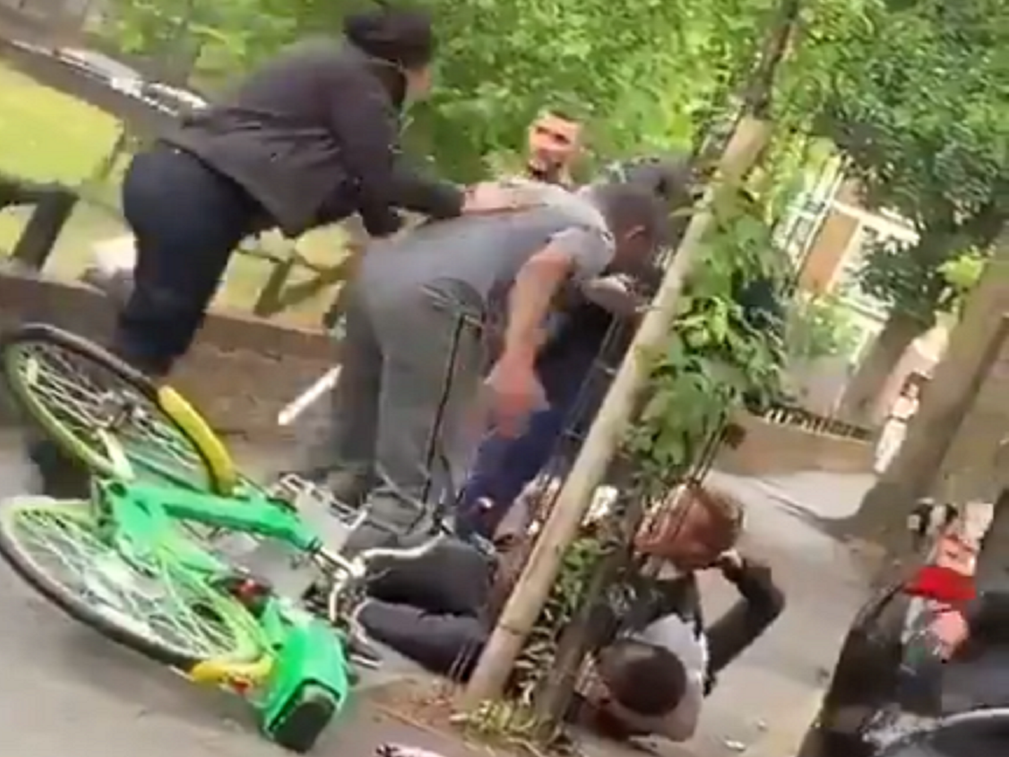 Still image taken from video footage showing an assault on two police officers in Hackney, London, 10 June 2020.