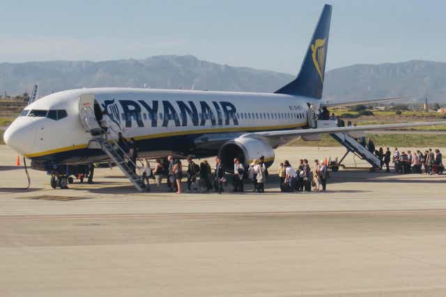 Well drilled? Ryanair passengers boarding a flight at Palma de Mallorca, before the Covid-19 pandemic
