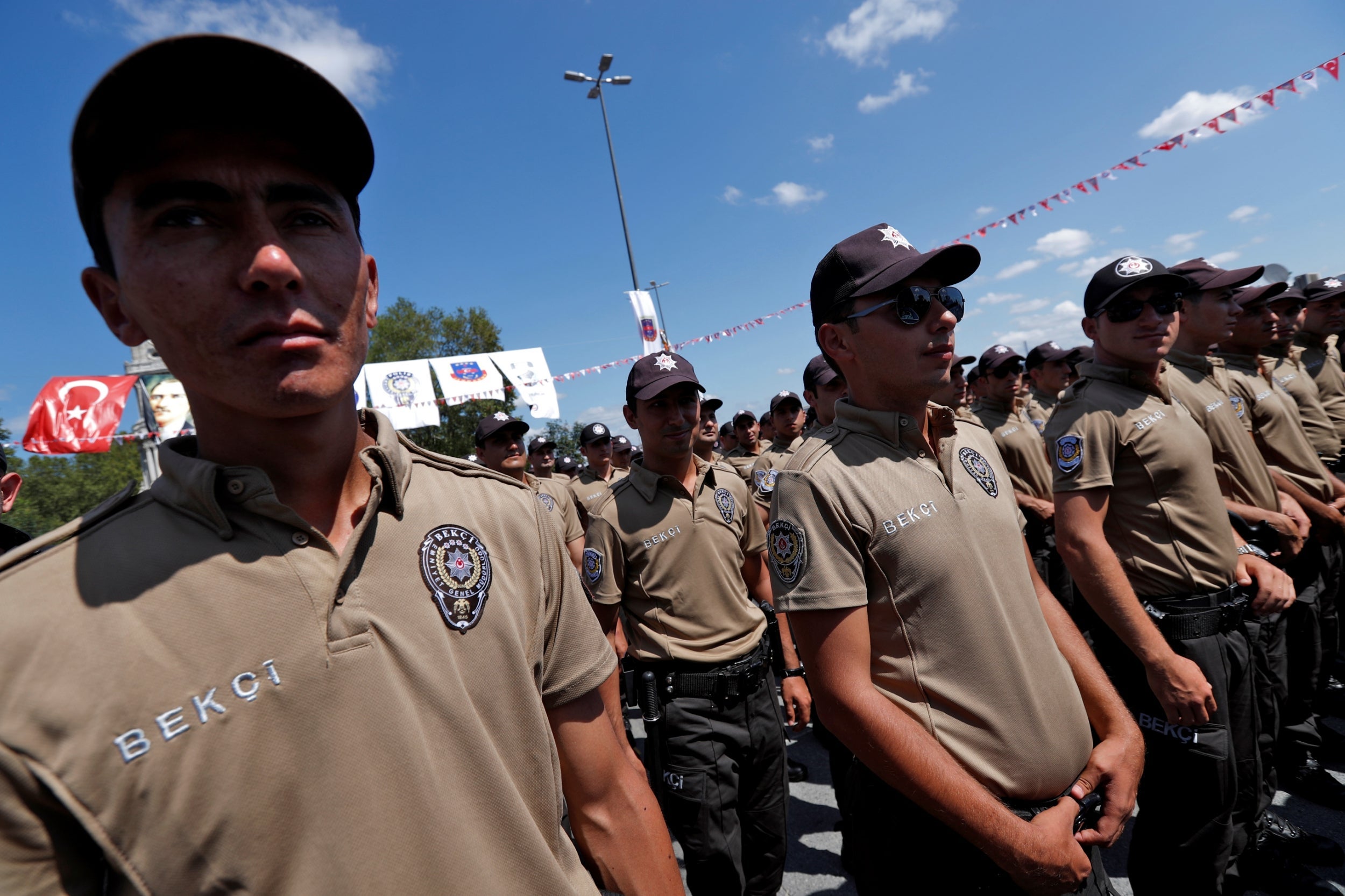 Members of the neighborhood guard force or watchmen are pictured during a ceremony in Istanbul, Turkey