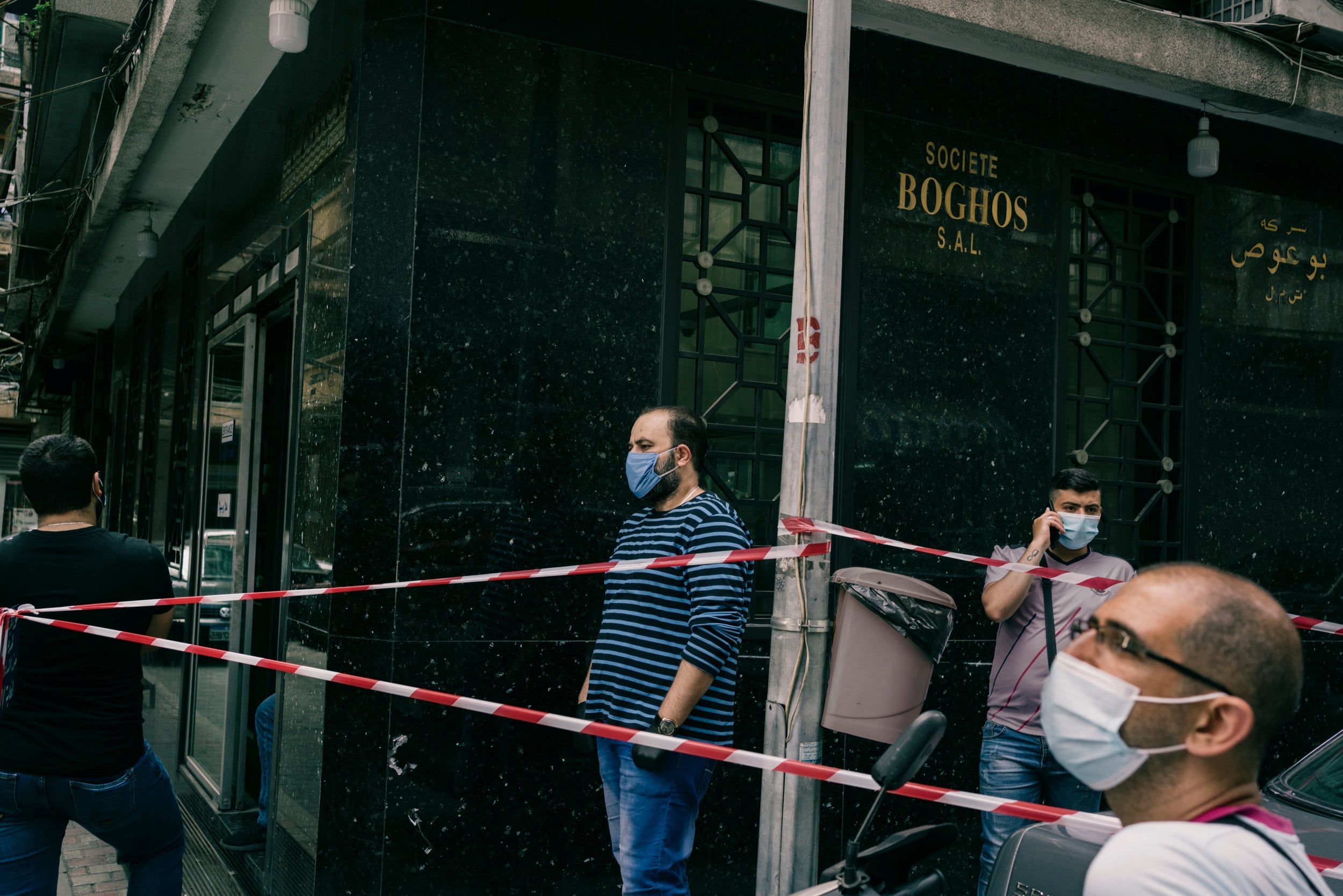 Businessmen line up outside a wholesale shop in Beirut (Washington Post/Lorenzo Tugnoli)