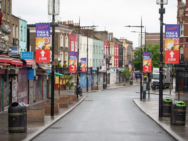 Camden High Street, in north London, normally be brimming with crowds of people, is deserted during the lockdown