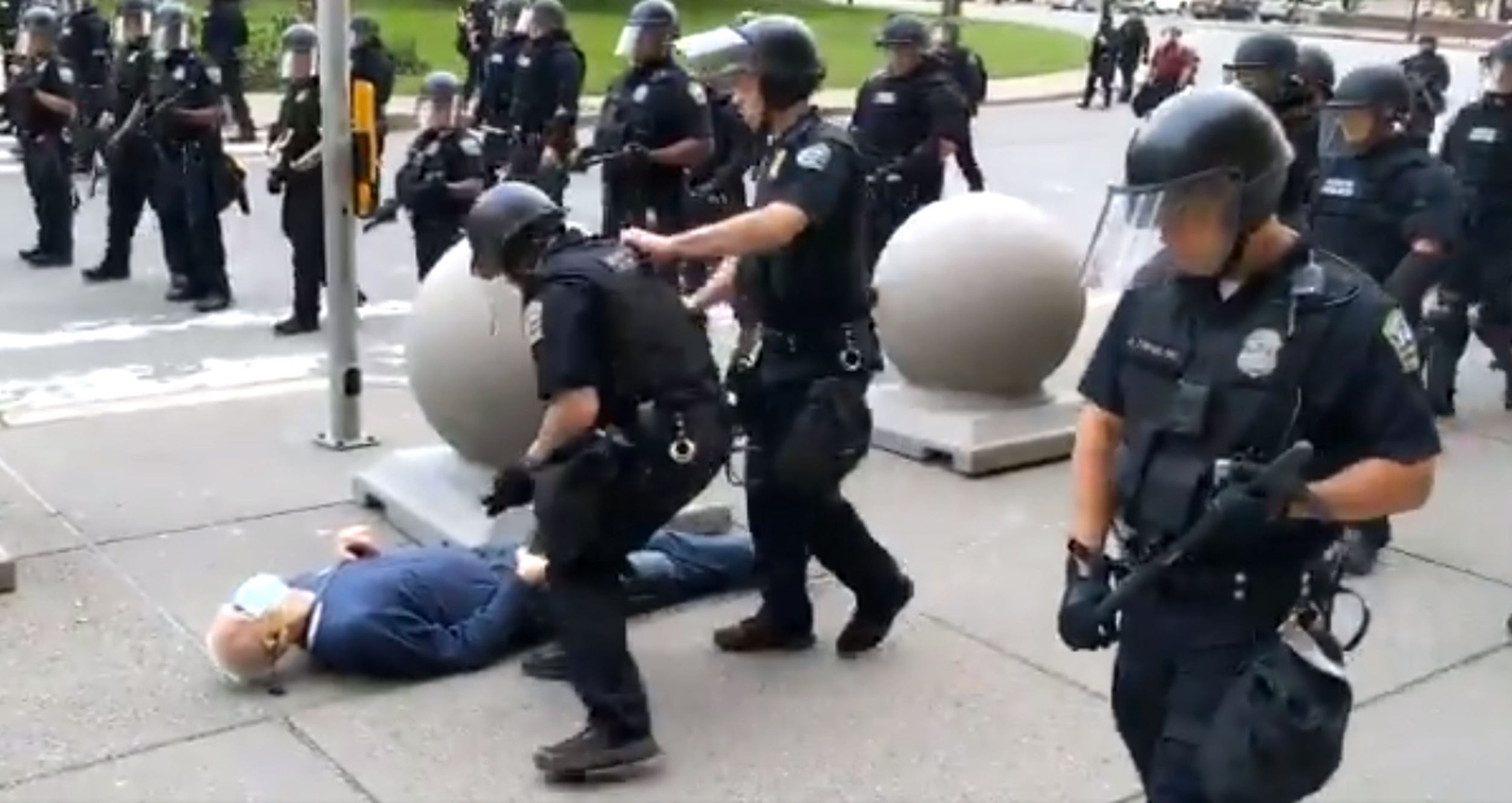 A still from the video of two Buffalo police officers shoving Martin Gugino to the ground