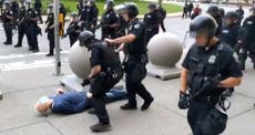 Protester pushed over by police and trolled by Trump has brain injury