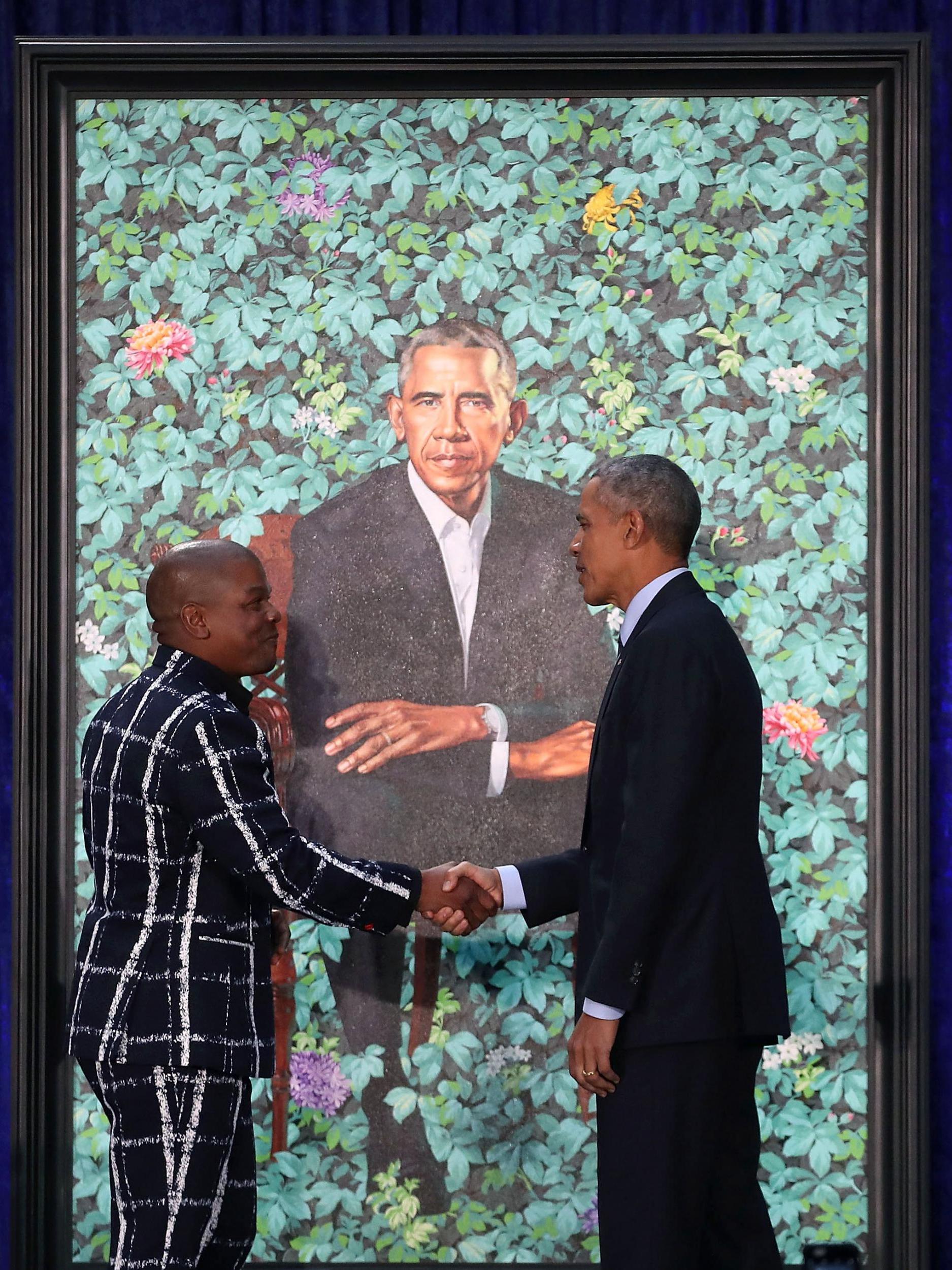 Kehinde Wiley with Barack Obama in front of his portrait in 2018