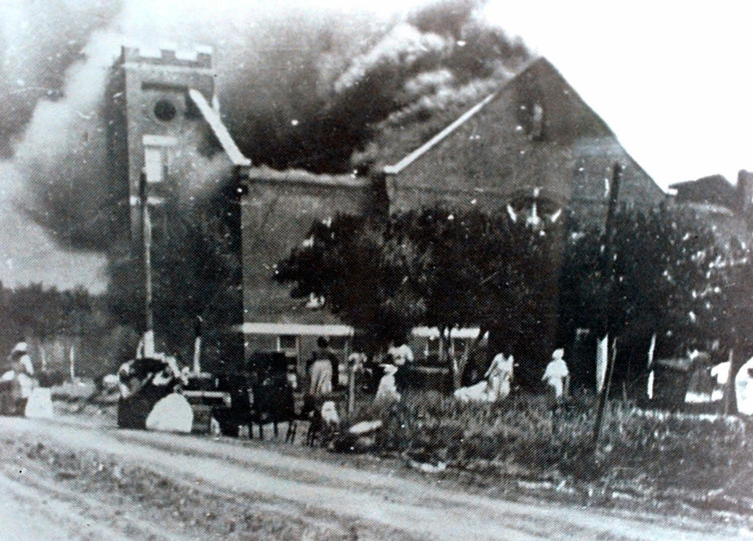 Mt Zion Baptist Church burns after being torched by white mobs during the 1921 Tulsa massacre