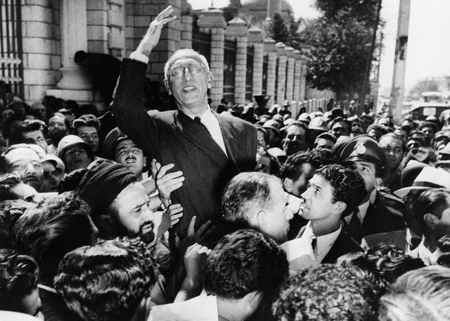 Prime minister Mohammad Mosaddegh rides on the shoulders of cheering crowds in Tehran’s Majlis Square on 27 September 1951, after reiterating his oil nationalisation views to supporters