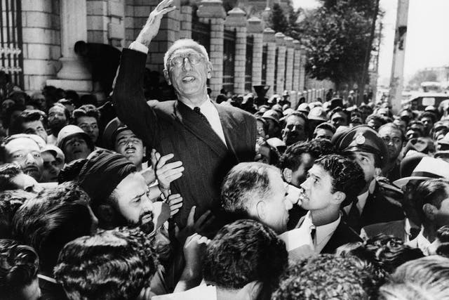 Prime minister Mohammad Mosaddegh rides on the shoulders of cheering crowds in Tehran’s Majlis Square on 27 September 1951, after reiterating his oil nationalisation views to supporters
