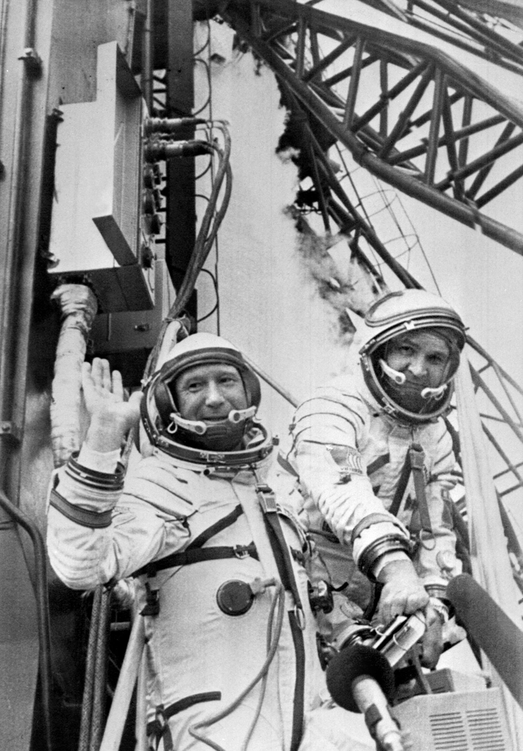 Leonov and fellow Russian cosmonaut Valeri Kubasov board the Soyuz spaceship before its launch from Baikonur in Kazakhstan