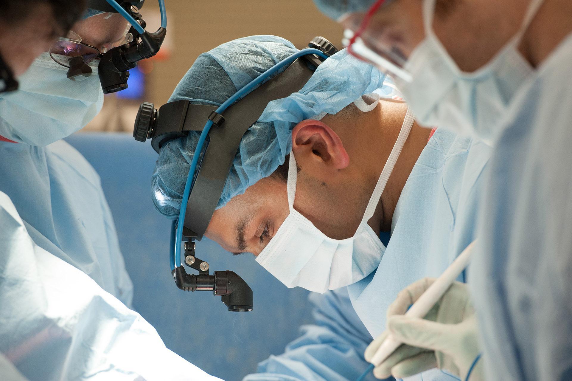 Dr Ankit Bharat (pictured) performs the first known lung transplant on a Chicago patient recovering from the coronavirus