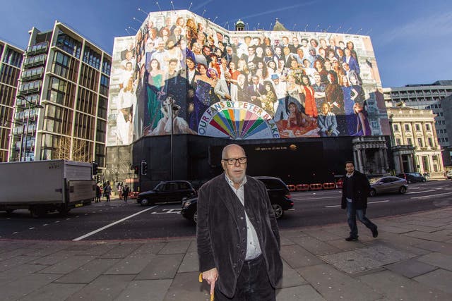 Sir Peter Blake stands in front of his mural, which was used to cover the Mandarin Oriental in Knightsbridge during its refurbishment