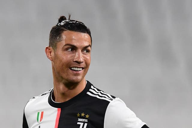 Ronaldo reacts after missing a penalty against Milan