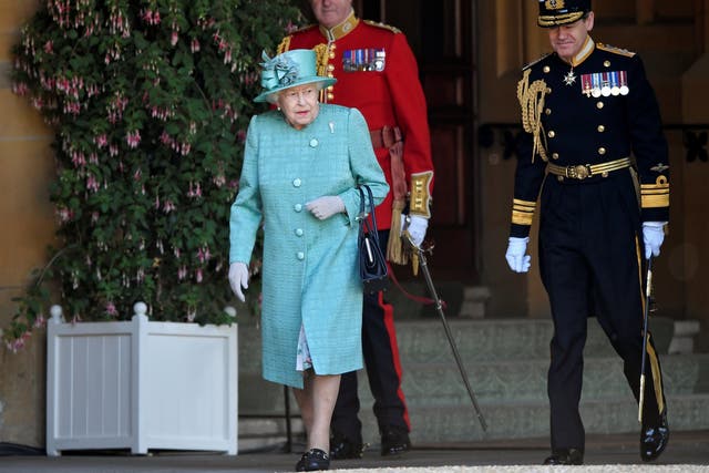 Britain's Queen Elizabeth attends a ceremony to mark her official birthday at Windsor Castle in Windsor, Britain, June 13, 2020