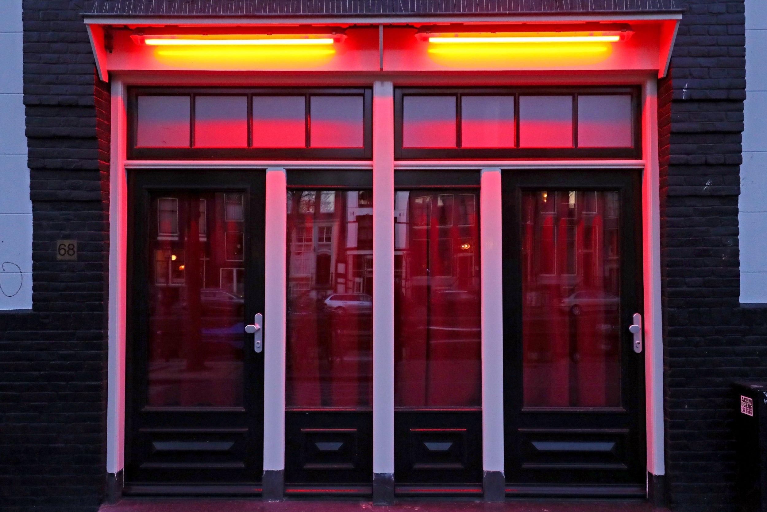 The windows are empty even as the rest of Amsterdam comes back to life