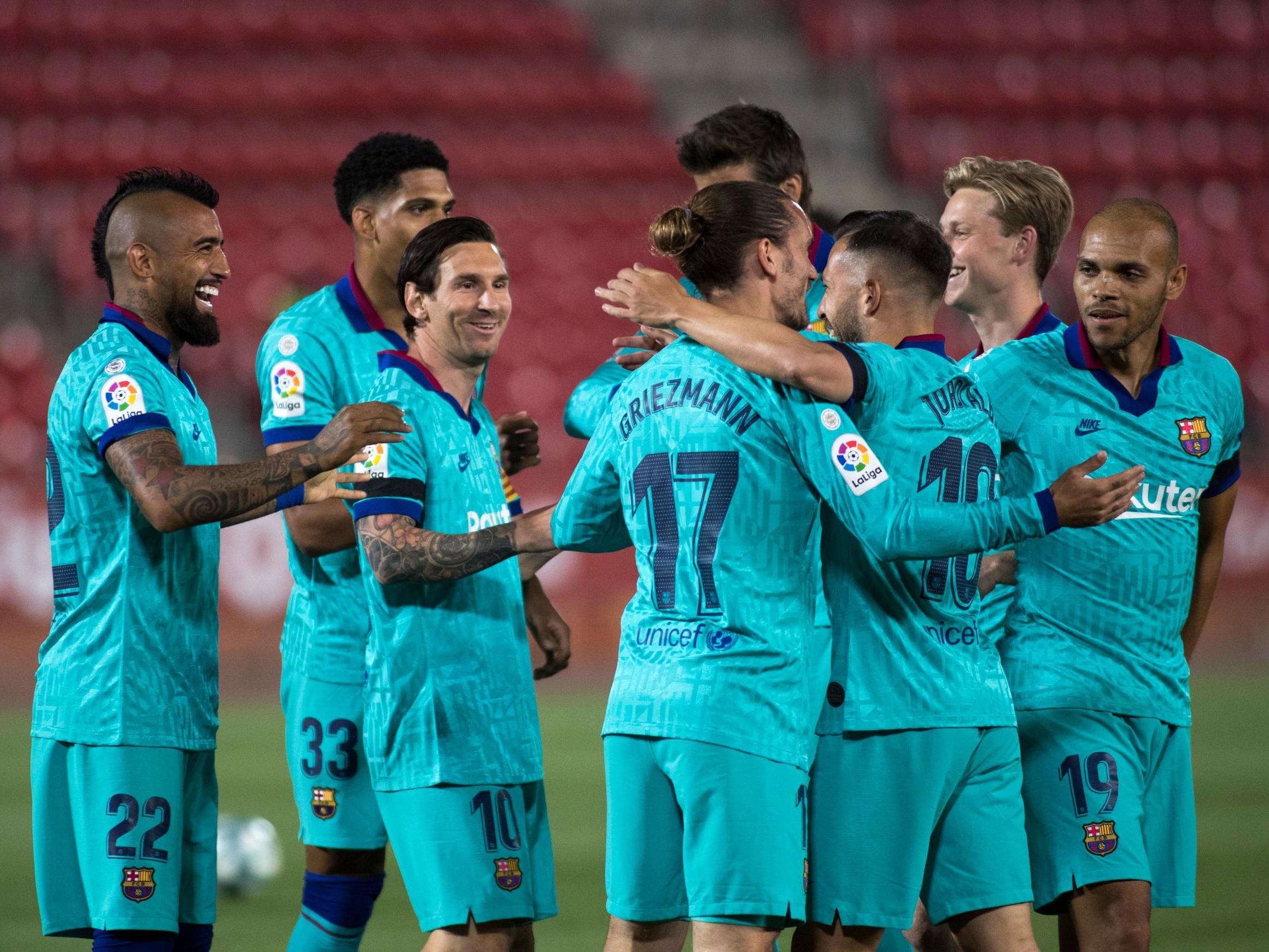 Barcelona celebrate after Vidal scores the opener in Mallorca
