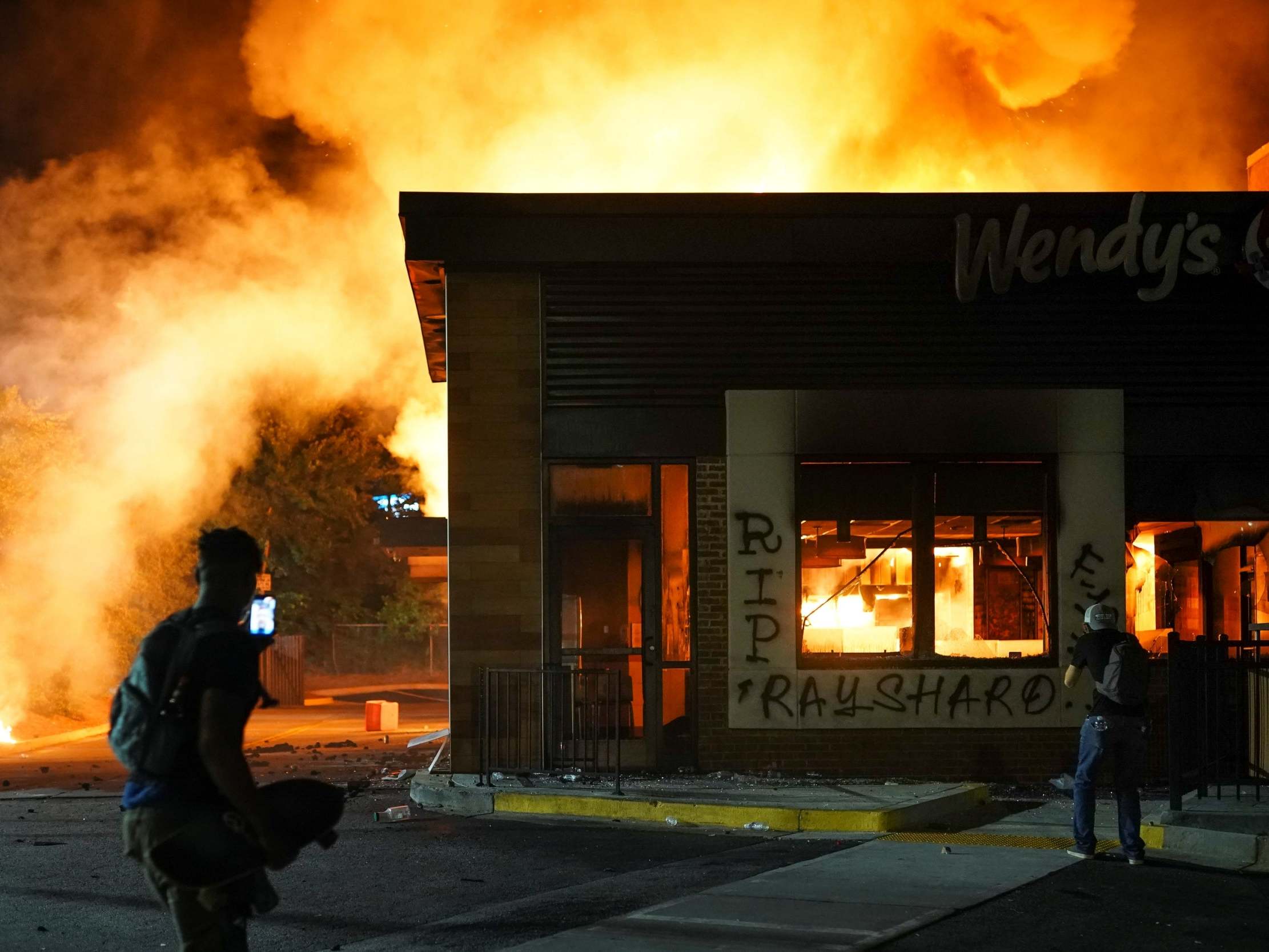 A Wendy's restaurant burns following a rally against racial inequality and the police shooting of Rayshard Brooks in Atlanta, Georgia, June 13, 2020