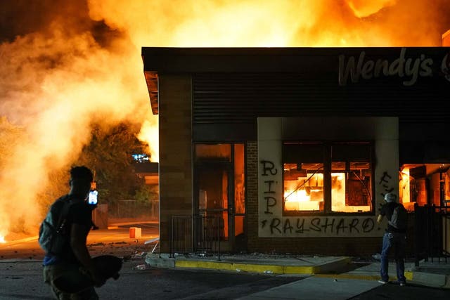 A Wendy's restaurant burns following a rally against racial inequality and the police shooting of Rayshard Brooks in Atlanta, Georgia, June 13, 2020