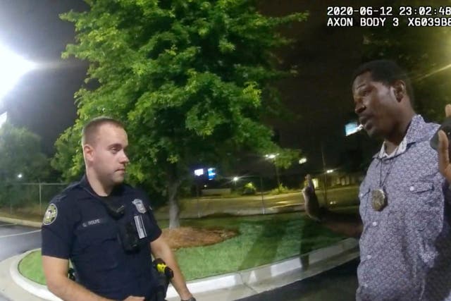 Video screen grab showing Rayshard Brooks speaking to police officer Garrett Rolfe during a traffic stop in Atlanta, Georgia. Shortly afterwards Brooks was shot dead