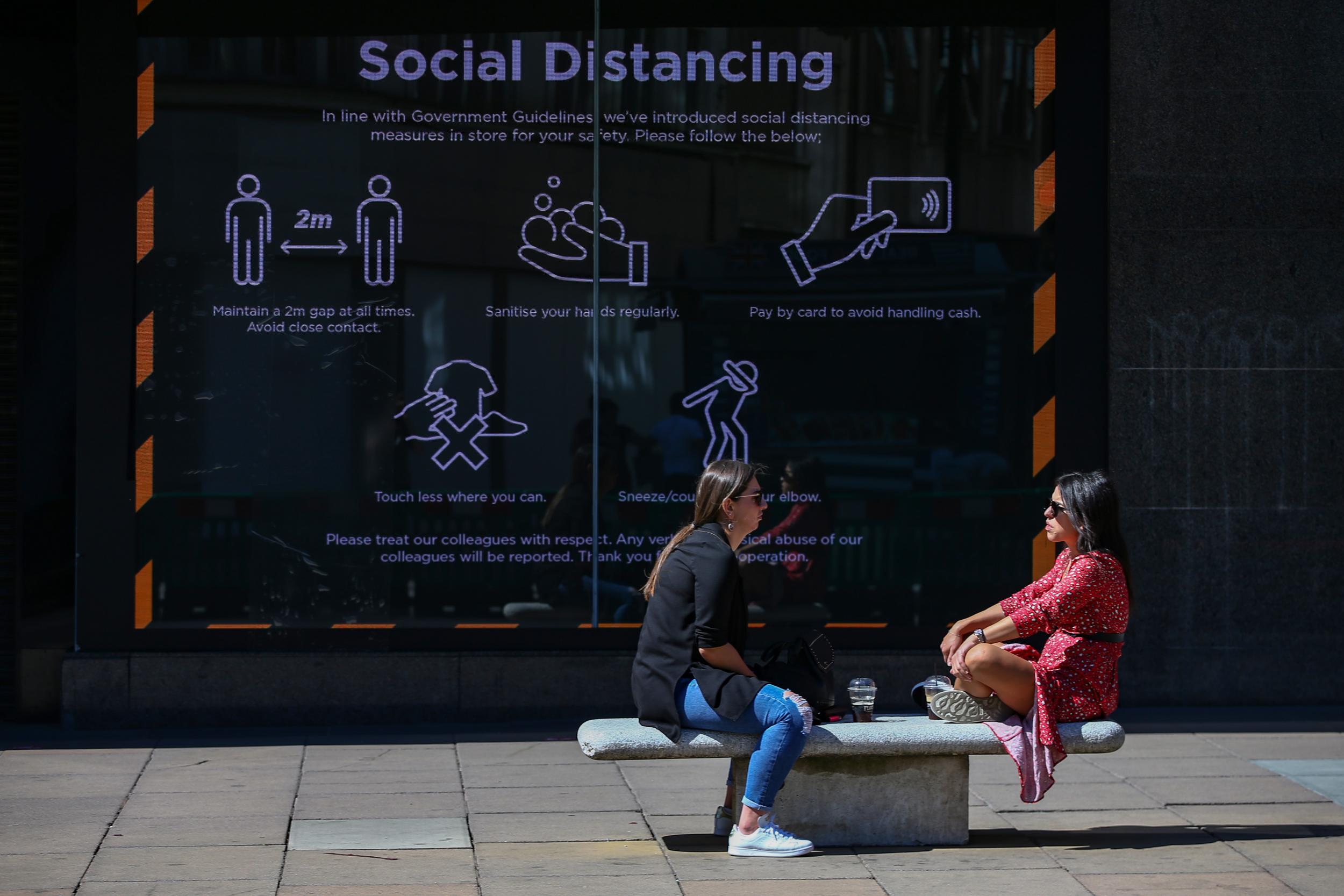 Social distancing measures displayed in a shop window on London’s Oxford Street. Many ‘non-essential’ shops are allowed to reopen from today (15 June) after being closed for more than two months