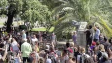 New Orleans protesters rip down bust of slave owner, throw it in river