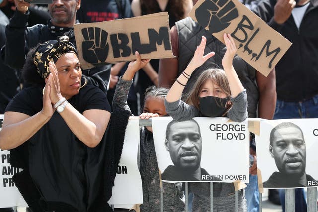 Demonstrators take part in a Black Lives Matter protest in Leeds in the wake of the killing of George Floyd by US police