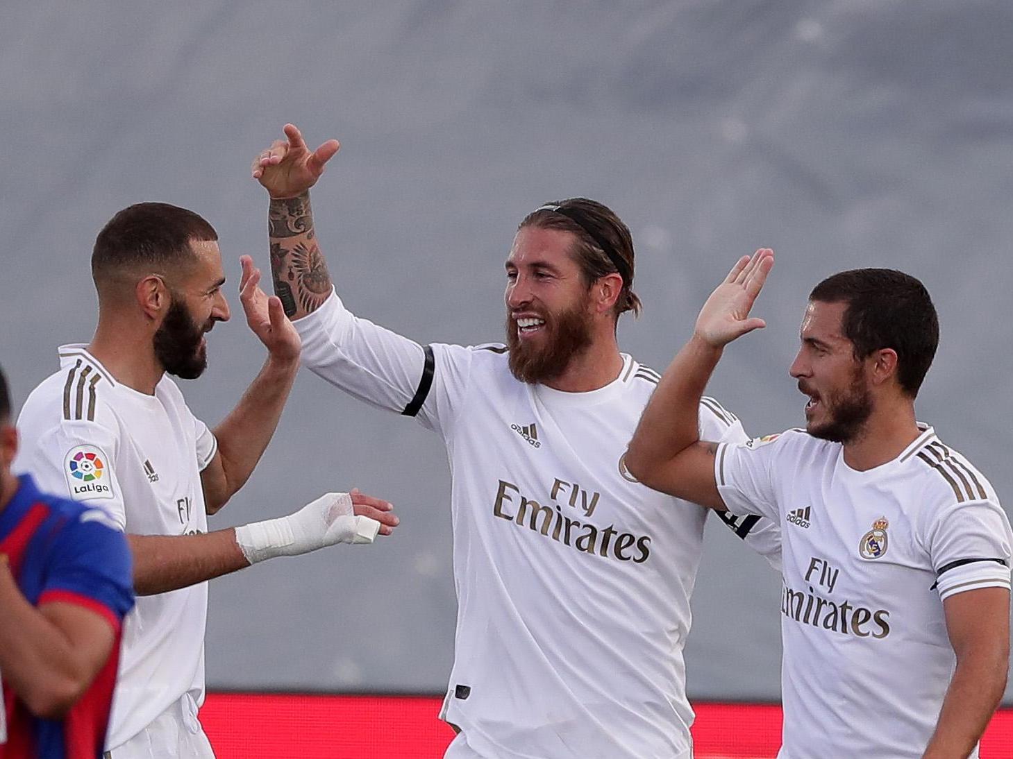 Eden Hazard and Karim Benzema congratulate Sergio Ramos