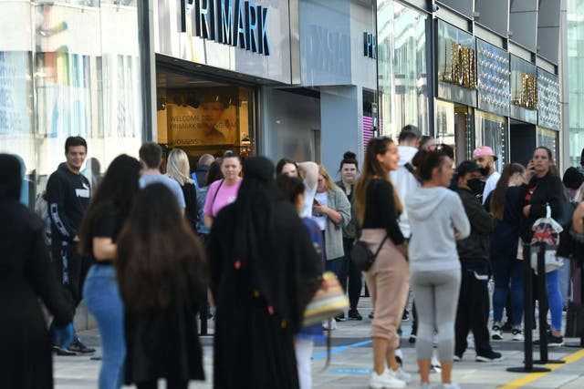 Shoppers in line at Primark in Birmingham as non-essential shops in England open their doors to customers for the first time since coronavirus lockdown restrictions were imposed in March