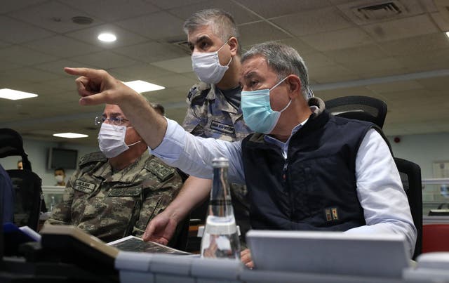 Turkish Defense Minister Hulusi Akar and army commanders follow the Operation Claw-Eagle in northern Iraq at Air Force Command Control Center in Ankara