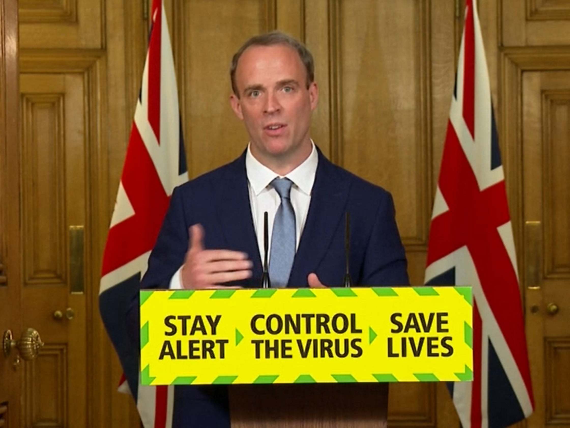 Dominic Raab reads out the latest statistics at coronavirus briefing