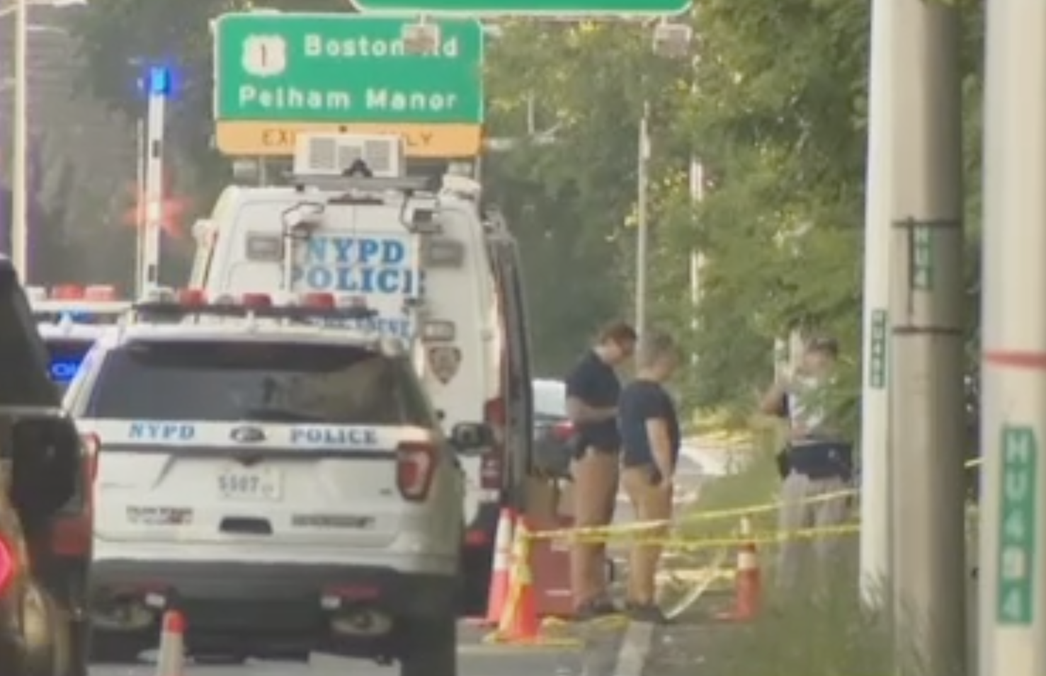 Police are investigating the discovery of the body of an unidentified man found bound and on fire beside a New York City highway