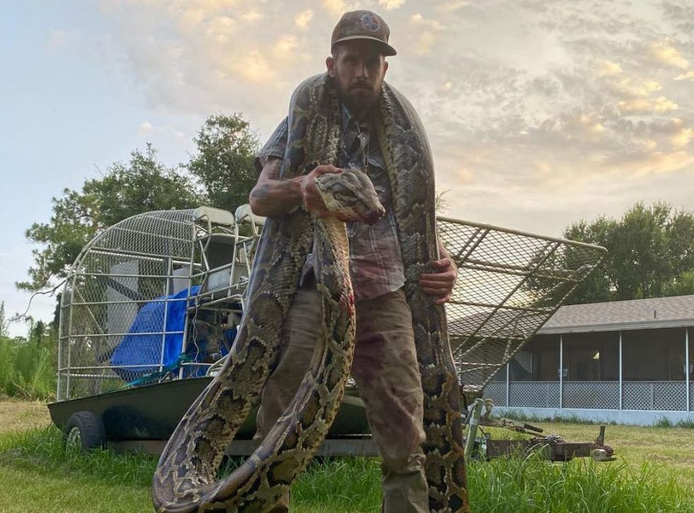 Mike Kimmel with the 17 foot long snake
