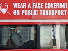 Face masks will be ‘new normal’ for another year, says Sadiq Khan